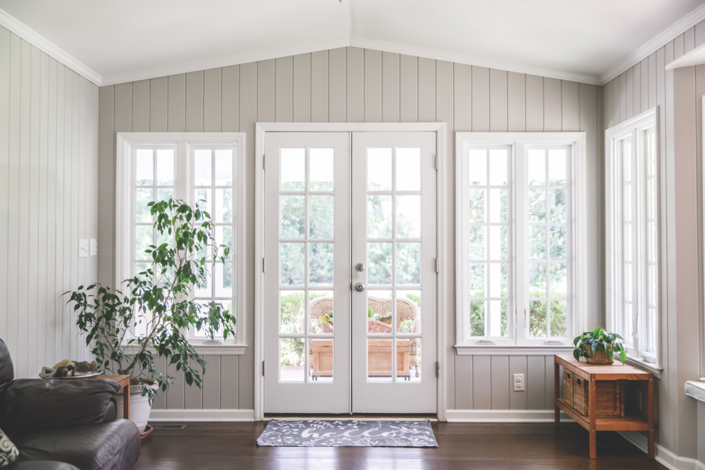 living-room-with-windows-and-indoor-plants